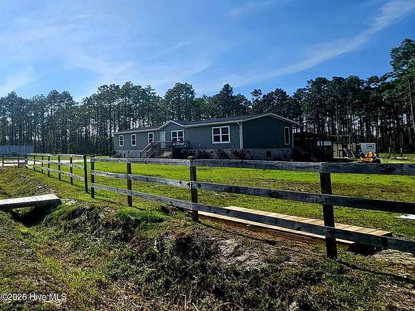 6.22 Acres of Land with Home for Sale in Hampstead, North Carolina