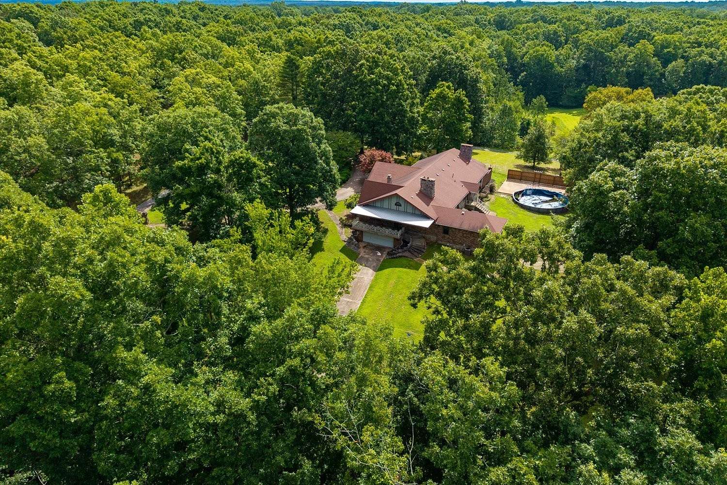 13.8 Acres of Land with Home for Sale in Summertown, Tennessee