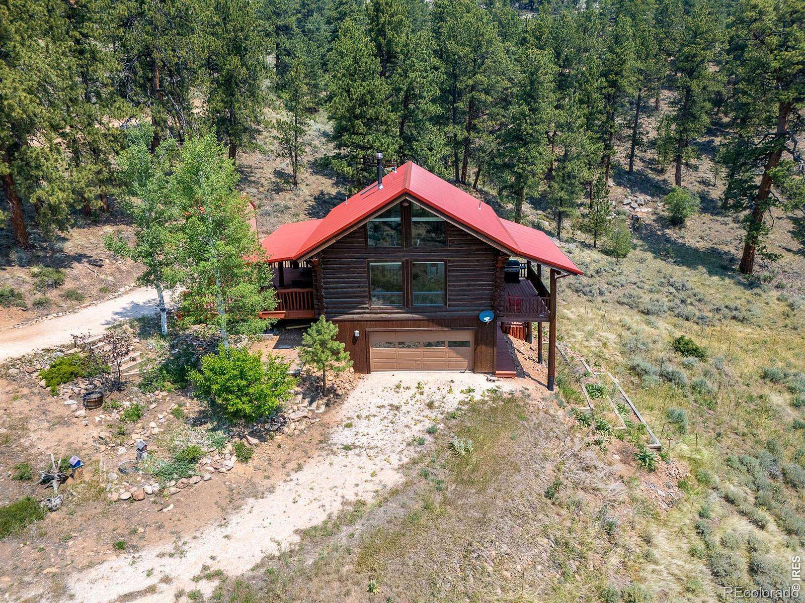 4 Acres of Land with Home for Sale in Red Feather Lakes, Colorado
