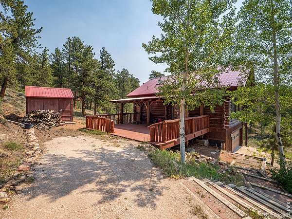 4 Acres of Land with Home for Sale in Red Feather Lakes, Colorado