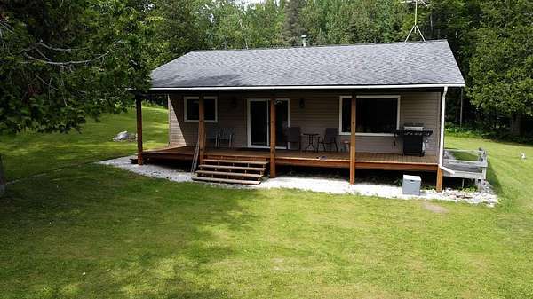 80 Acres of Recreational Land with Home for Sale in Hessel, Michigan