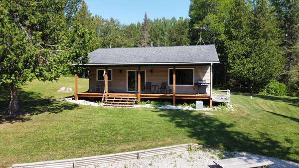 80 Acres of Recreational Land with Home for Sale in Hessel, Michigan