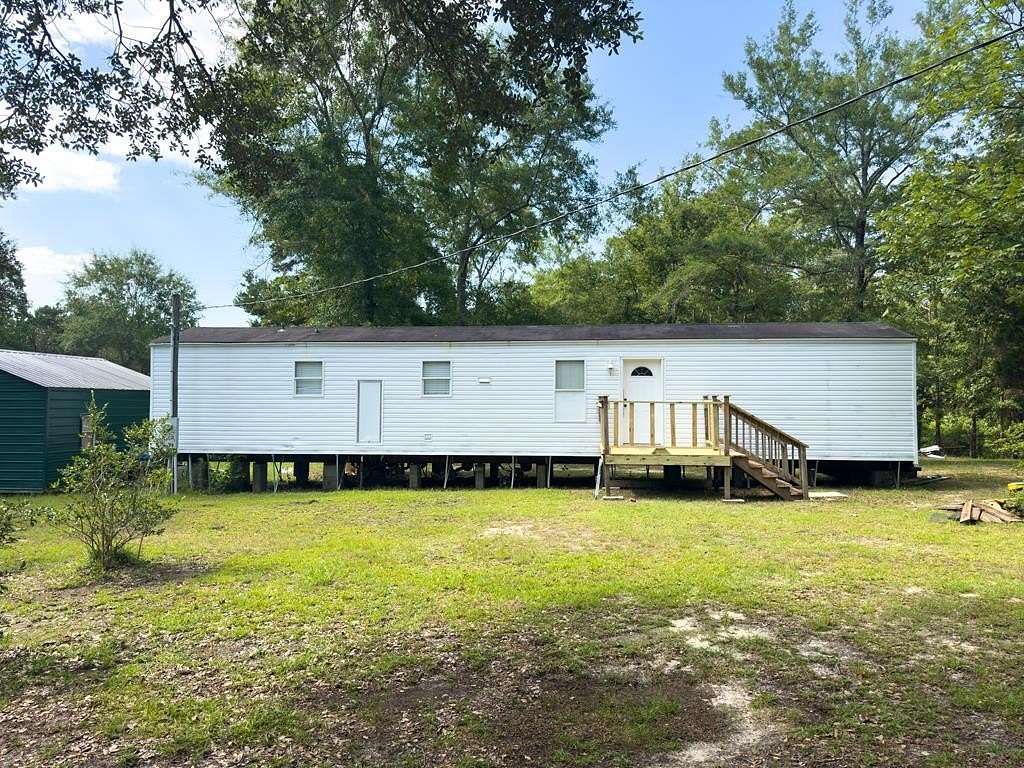 3.56 Acres of Land with Home for Sale in Poplarville, Mississippi