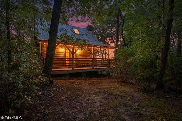23.5 Acres of Land with Home for Sale in Millers Creek, North Carolina