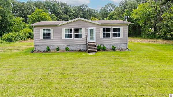 1.56 Acres of Land with Home for Sale in Paducah, Kentucky
