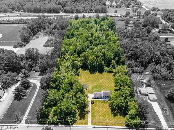 9.34 Acres of Land with Home for Sale in Sheffield Lake, Ohio