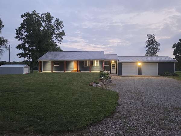2.5 Acres of Land with Home for Sale in Horton, Michigan