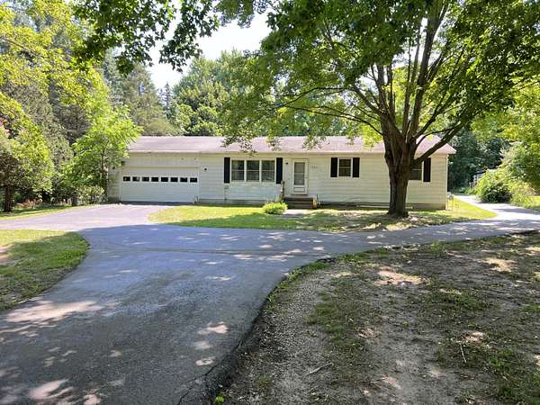2.66 Acres of Land with Home for Sale in Rockford, Michigan