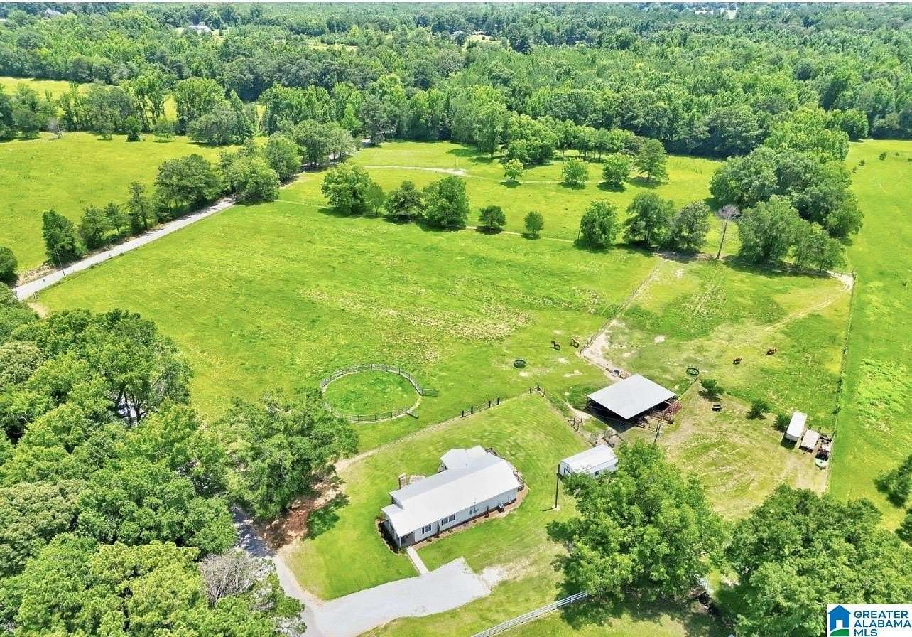 12.7 Acres of Land with Home for Sale in Jemison, Alabama