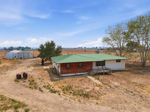 32 Acres of Agricultural Land with Home for Sale in Austin, Colorado