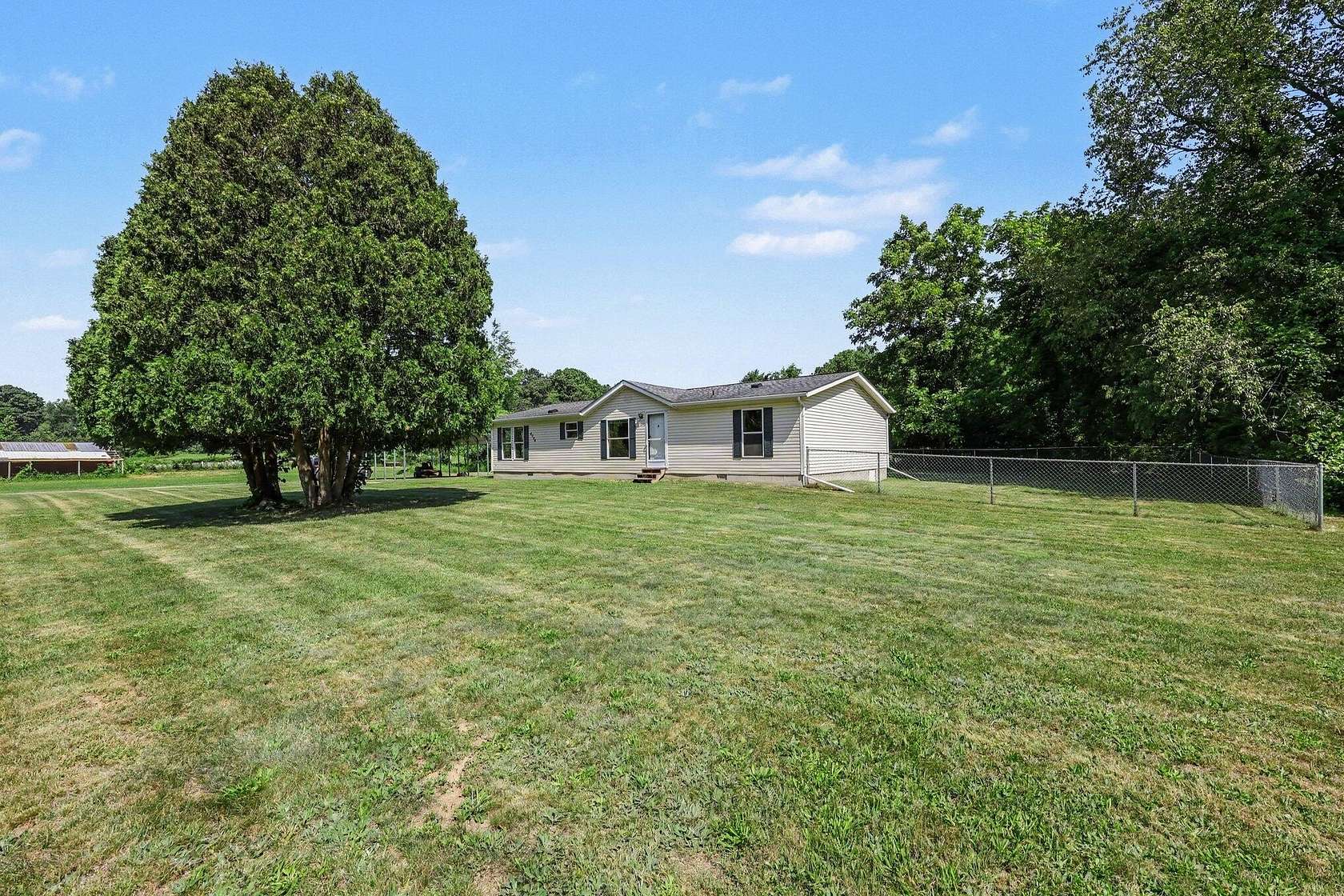 25.9 Acres of Land with Home for Sale in Jackson, Michigan