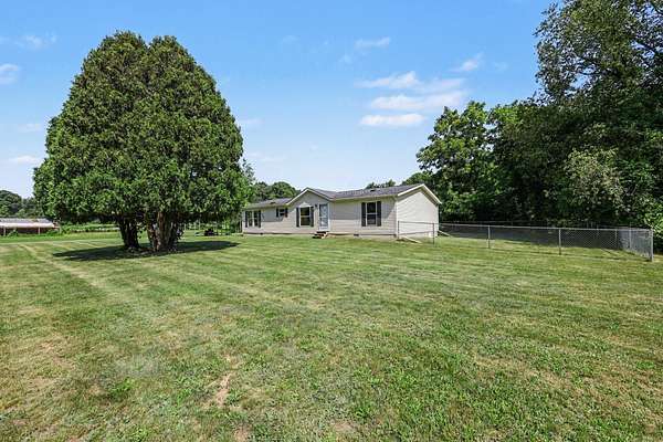 25.9 Acres of Land with Home for Sale in Jackson, Michigan