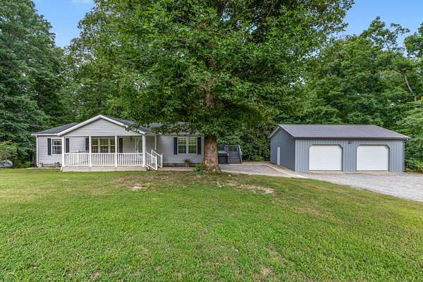 14.5 Acres of Land with Home for Sale in Ashland City, Tennessee