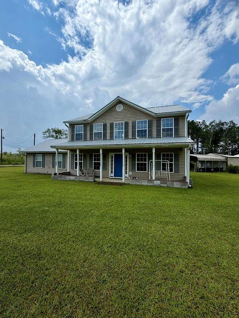 6.4 Acres of Land with Home for Sale in Nashville, Georgia