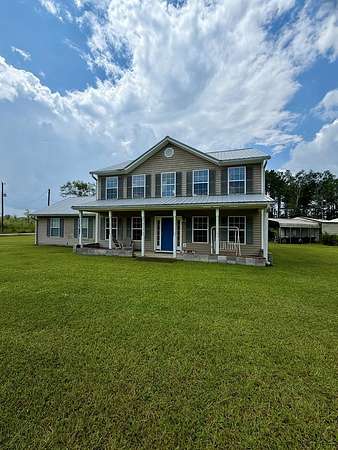 6.4 Acres of Land with Home for Sale in Nashville, Georgia