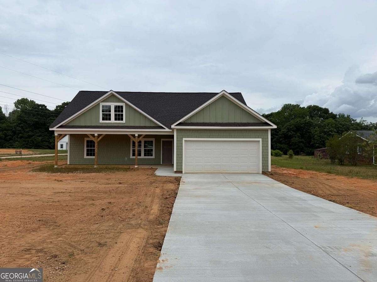 1.5 Acres of Land with Home for Sale in Comer, Georgia