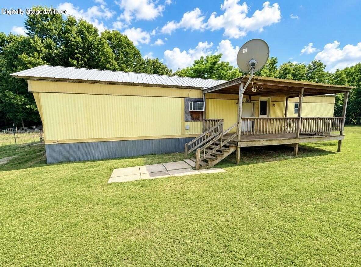 20.8 Acres of Land with Home for Sale in Koshkonong, Missouri