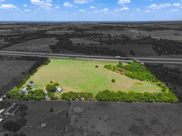 12.5 Acres of Land with Home for Sale in Grandview, Texas