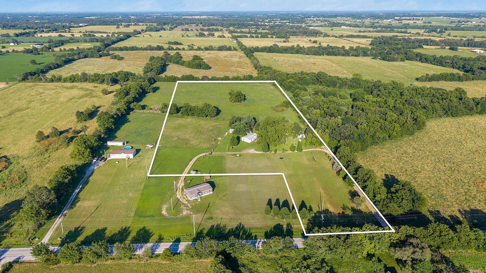 13.2 Acres of Land with Home for Sale in Marionville, Missouri