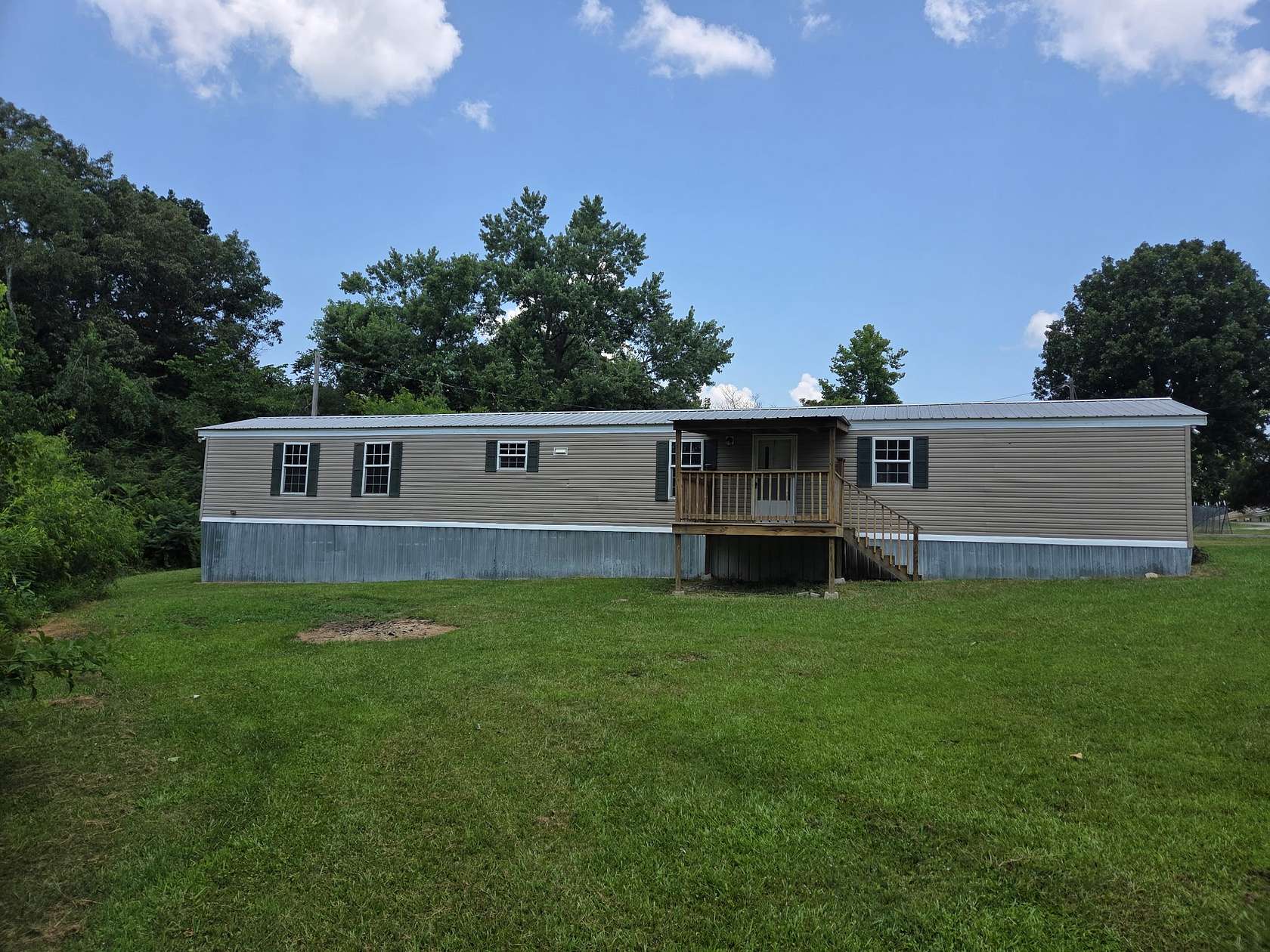 1.68 Acres of Land with Home for Sale in Hohenwald, Tennessee
