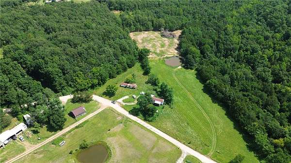2.76 Acres of Land with Home for Sale in Elkins, Arkansas