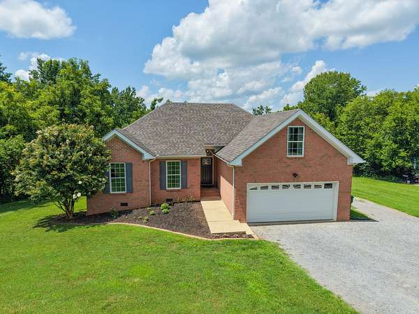 1.56 Acres of Land with Home for Sale in Bon Aqua, Tennessee