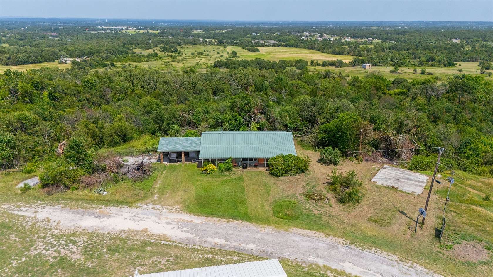 4.49 Acres of Land with Home for Sale in Springtown, Texas