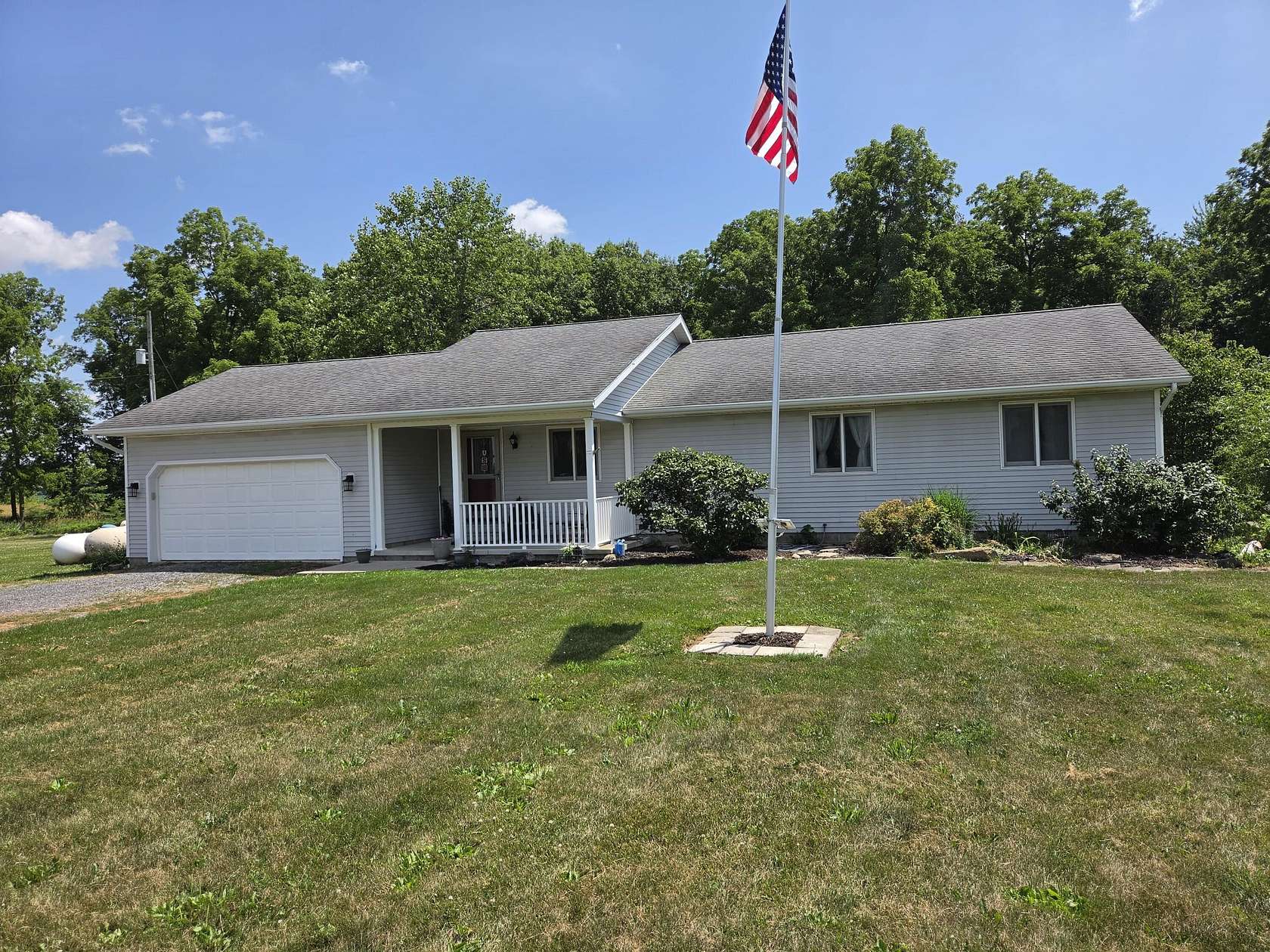 30 Acres of Land with Home for Sale in Camden, Michigan