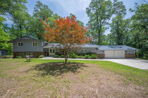 5.3 Acres of Land with Home for Sale in Cassville, Missouri