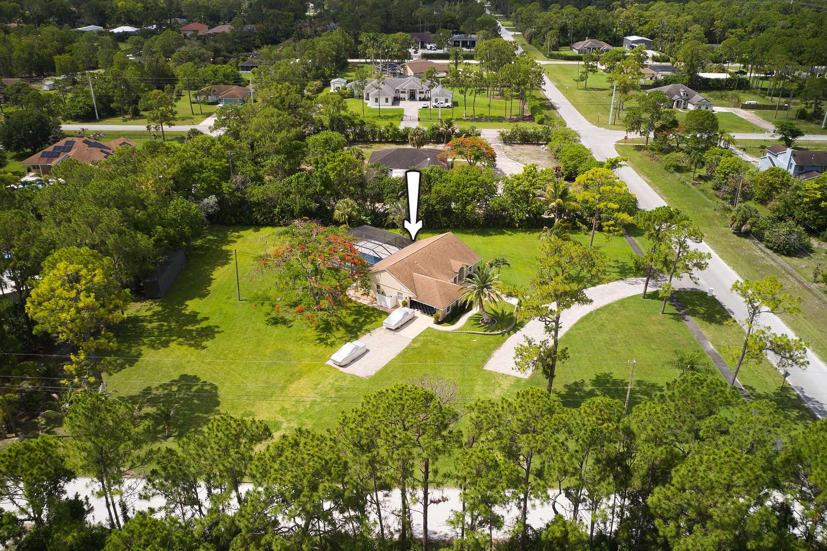 1.66 Acres of Land with Home for Sale in Loxahatchee Groves, Florida