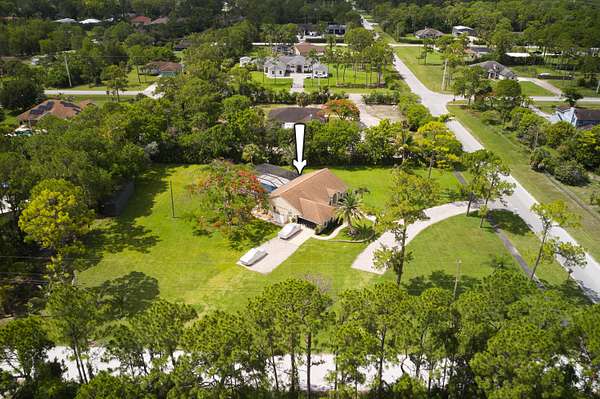 1.66 Acres of Land with Home for Sale in Loxahatchee Groves, Florida