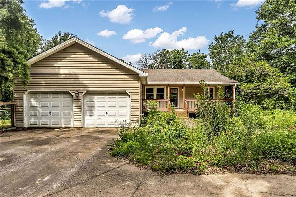 10.7 Acres of Land with Home for Sale in Drexel, Missouri