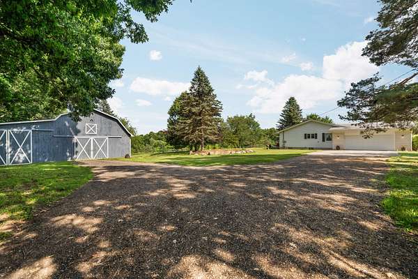 10 Acres of Land with Home for Sale in Whitmore Lake, Michigan