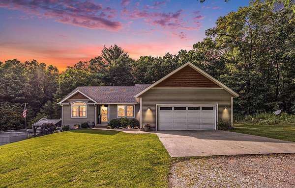 5 Acres of Land with Home for Sale in Twin Lake, Michigan