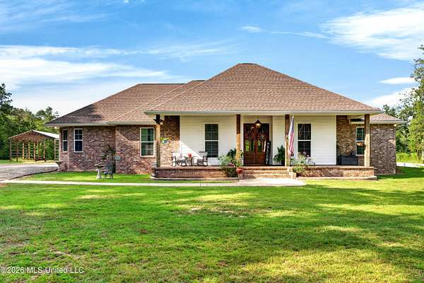41.4 Acres of Land with Home for Sale in Carriere, Mississippi