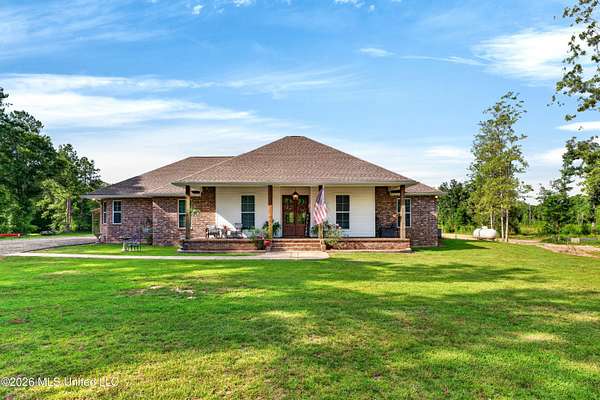 41.4 Acres of Land with Home for Sale in Carriere, Mississippi