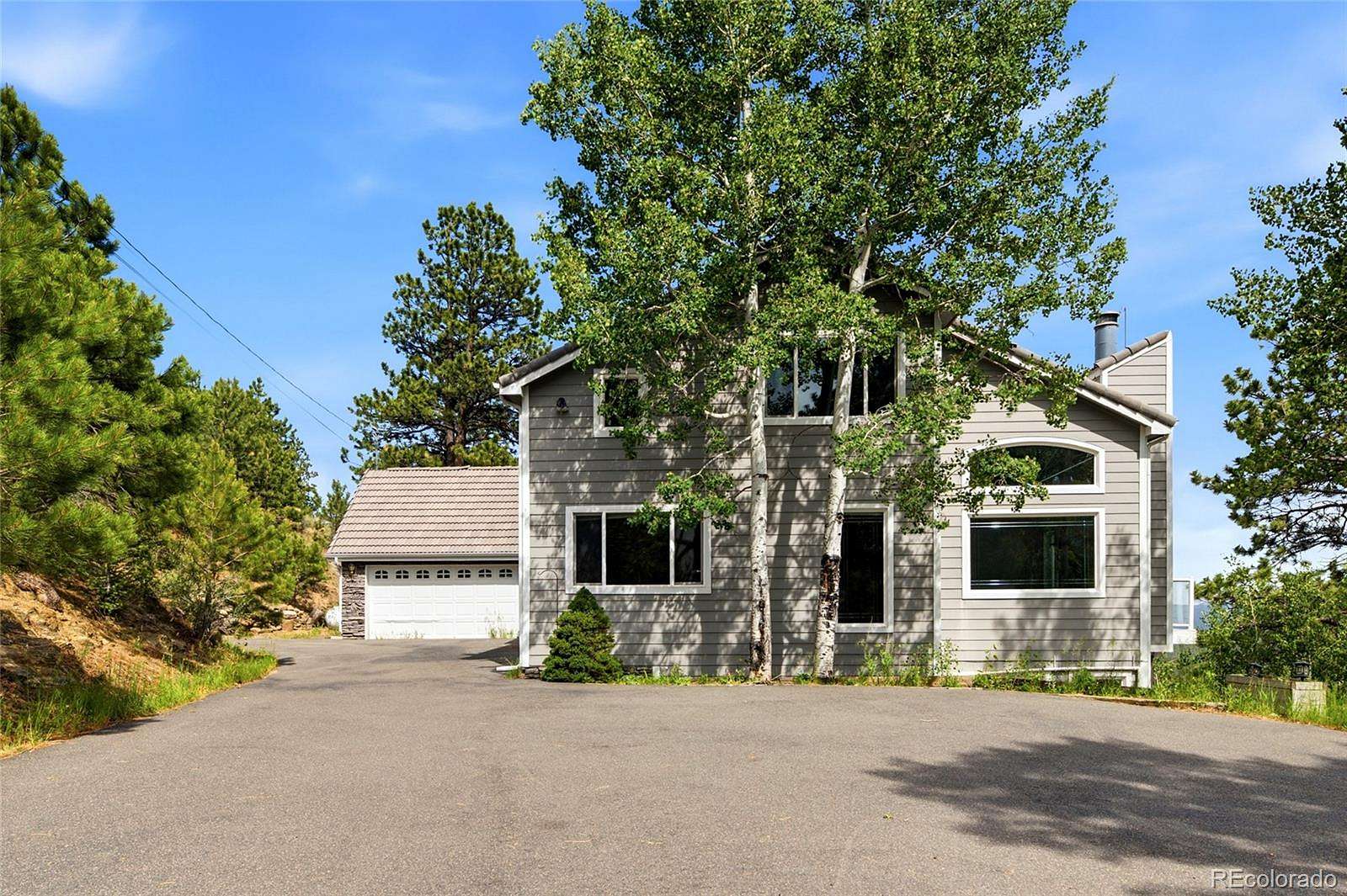 5 Acres of Land with Home for Sale in Evergreen, Colorado
