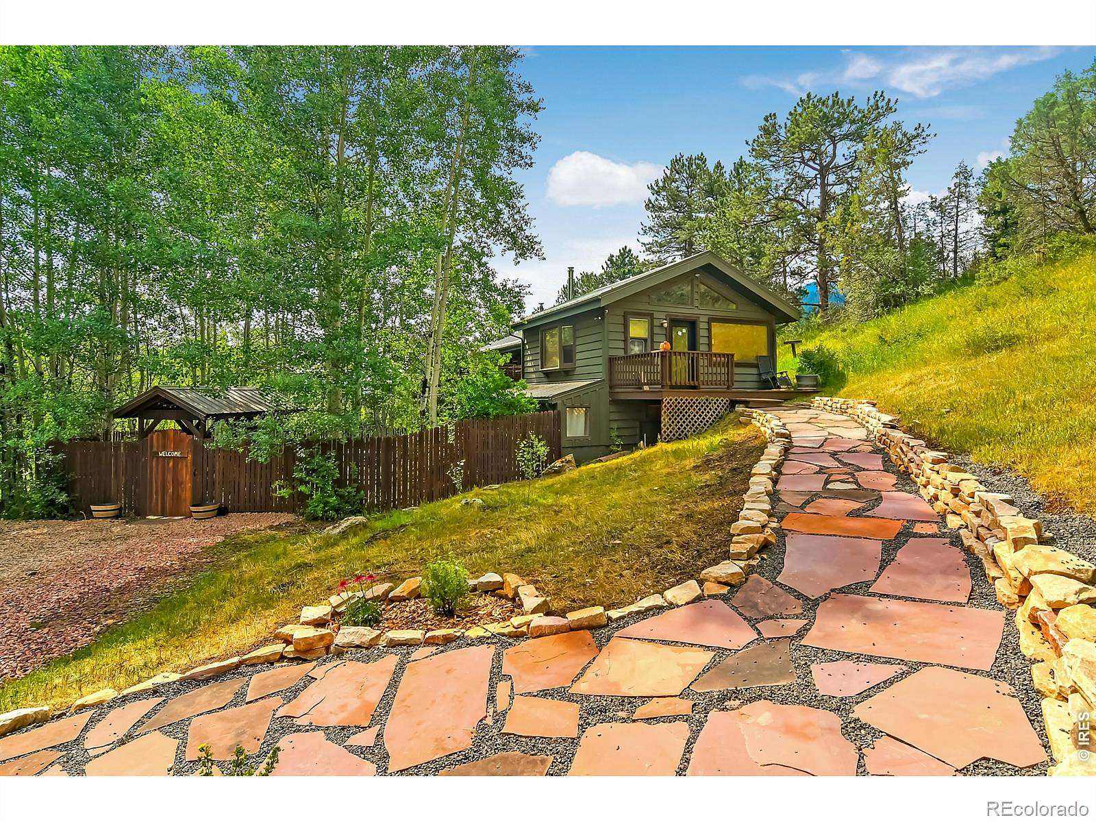 2.67 Acres of Land with Home for Sale in Glen Haven, Colorado
