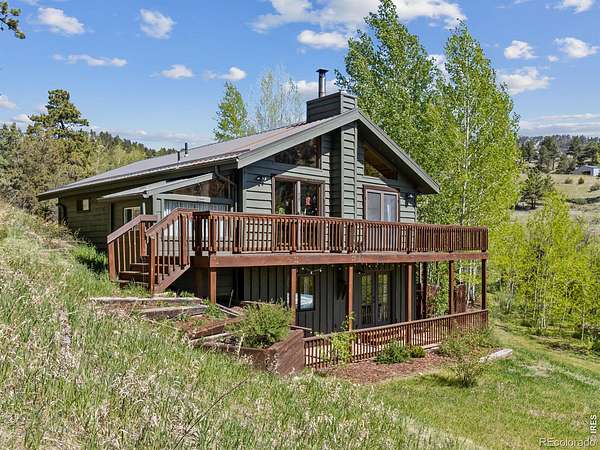 2.67 Acres of Land with Home for Sale in Glen Haven, Colorado