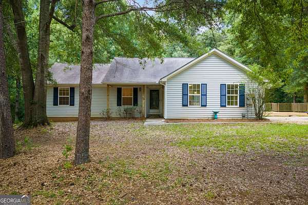 8.4 Acres of Land with Home for Sale in McDonough, Georgia