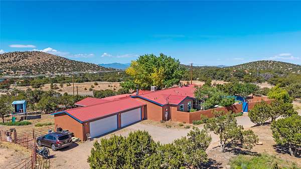 5 Acres of Land with Home for Sale in Santa Fe, New Mexico