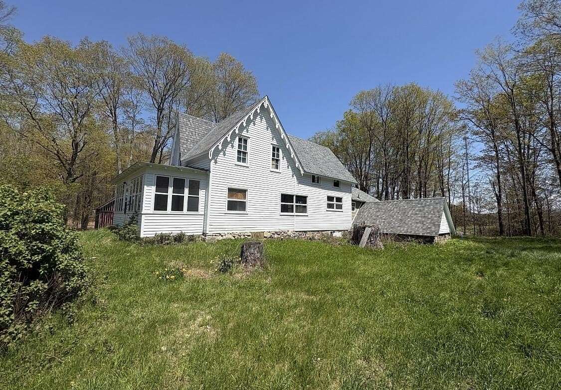 7.14 Acres of Land with Home for Sale in Bear Lake, Michigan