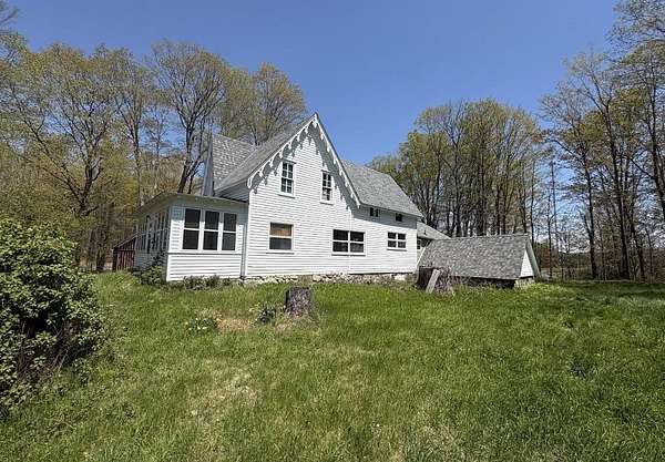 7.14 Acres of Land with Home for Sale in Bear Lake, Michigan