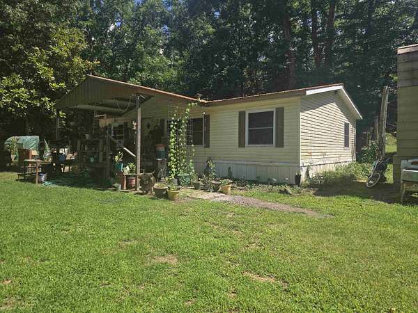 3.85 Acres of Land with Home for Sale in Waldron, Arkansas