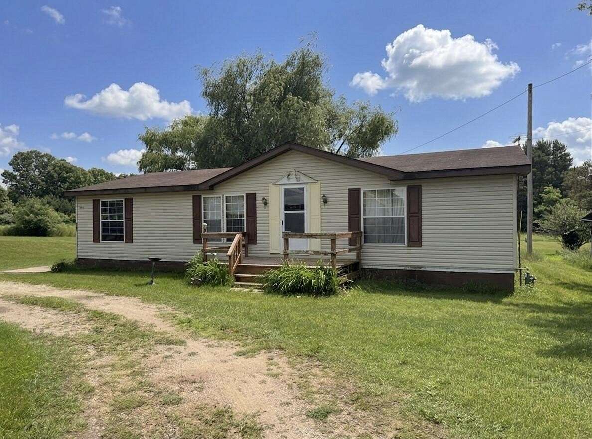 6 Acres of Land with Home for Sale in Cedar Springs, Michigan