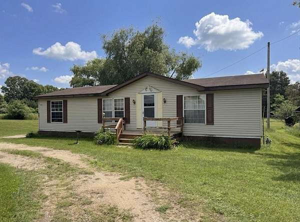 6 Acres of Land with Home for Sale in Cedar Springs, Michigan