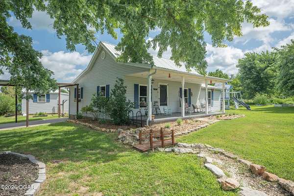 8.8 Acres of Land with Home for Sale in Neosho, Missouri