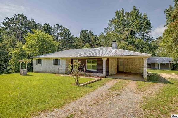 20.3 Acres of Land with Home for Sale in Eros, Louisiana