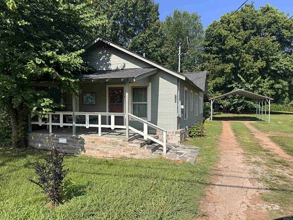 9.65 Acres of Land with Home for Sale in Clarksville, Arkansas
