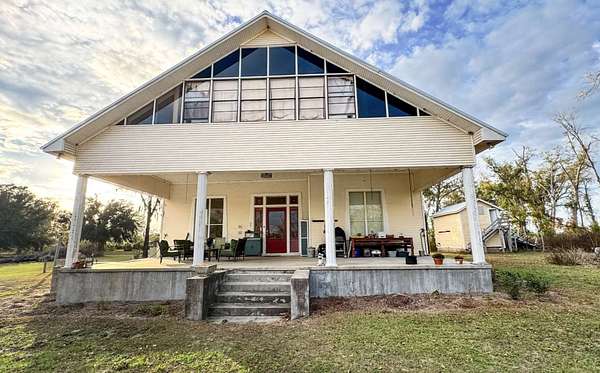 27.6 Acres of Agricultural Land with Home for Sale in Jennings, Florida